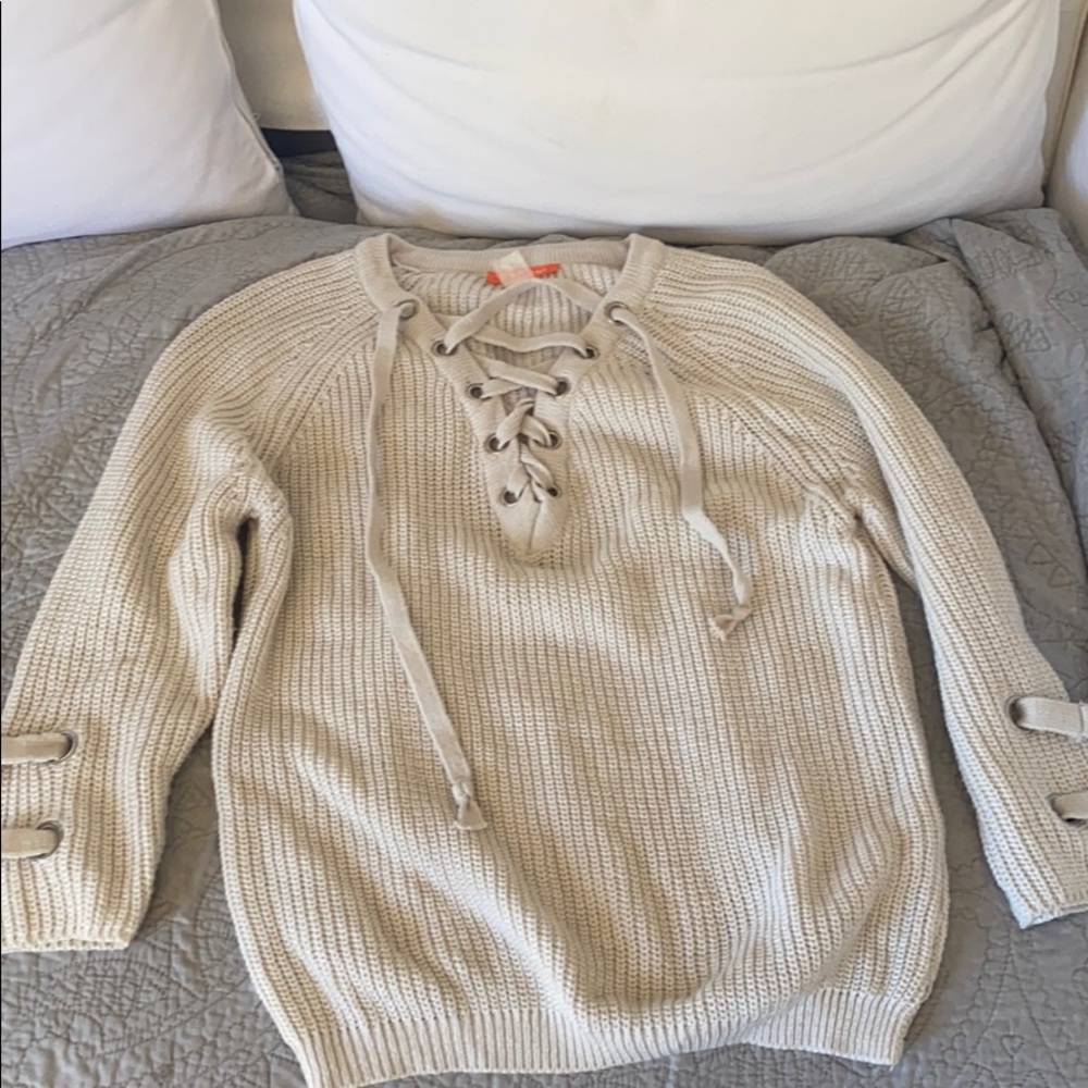 Cream lace up sweater